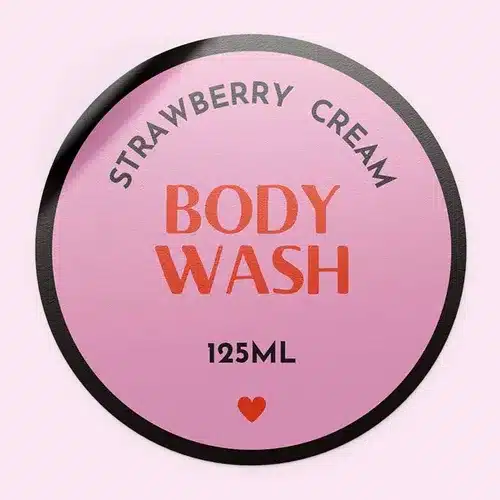 Polypropylene-Synthetic-Labels-Circle-Bodywash-Stickerjpg Pink circular label for Strawberry Cream Body Wash, 125ml, featuring bold red text and a tiny heart motif on a light pink background. | Sky Rye Design Pink circular label for Strawberry Cream Body Wash, 125ml, featuring bold red text and a tiny heart motif on a light pink background.