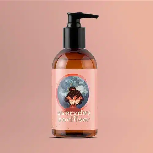 Polypropylene-Synthetic-Labels-Square-Sanitiser-Bottlejpg Amber bottle of everyday sanitizer with pump dispenser and cartoon girl label, set against a peach background. | Sky Rye Design Amber bottle of everyday sanitizer with pump dispenser and cartoon girl label, set against a peach background.