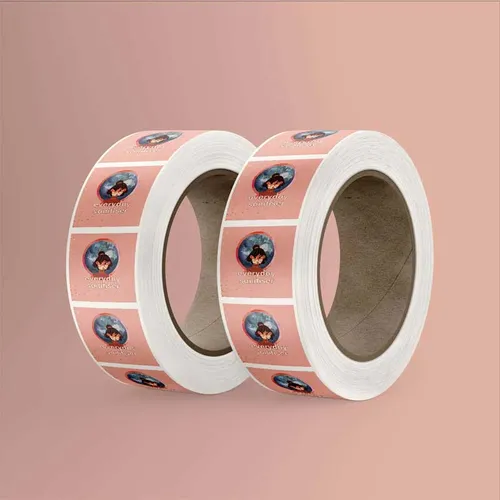 Polypropylene-Synthetic-Labels-Square-Sanitiser-Rolljpg Rolls of custom printed stickers with anime characters and text on a pink background, perfect for branding or decoration. | Sky Rye Design Rolls of custom printed stickers with anime characters and text on a pink background, perfect for branding or decoration.