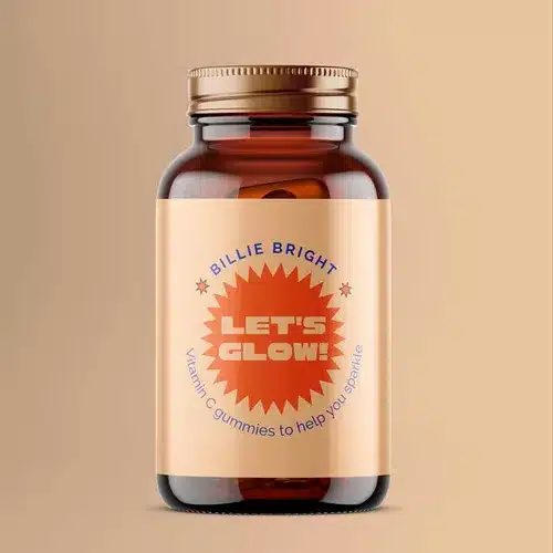 Polypropylene-Synthetic-Labels-Square-Vitamins-Jarjpg Brown bottle of Let's Glow! Vitamin Gummies by Billie Bright, designed to enhance your sparkle, on a beige background. | Sky Rye Design Brown bottle of Let's Glow! Vitamin Gummies by Billie Bright, designed to enhance your sparkle, on a beige background.