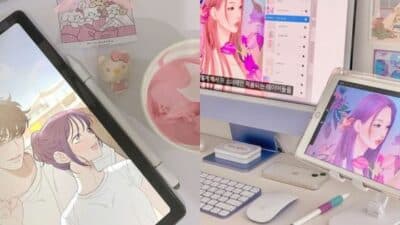 Digital art workspace with tablets displaying anime illustrations, cute stationery, and a keyboard, creating a cozy creative atmosphere.