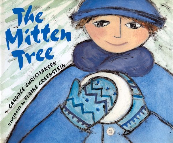 Illustrated book cover of The Mitten Tree showing a smiling child in winter attire holding a mitten against a snowy background.