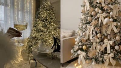 Elegant Christmas trees adorned with white lights and gold ornaments in a cozy living room setting.