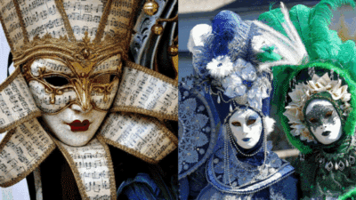 Ornate Venetian masks with musical and floral designs at a colorful festival.