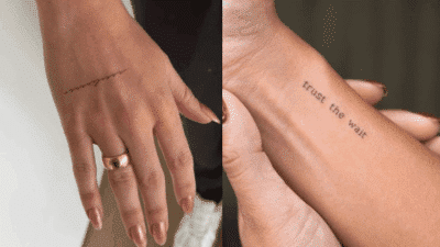 Minimalist tattoos on hands: one with trust the wait text, another with a delicate line design. Simple and meaningful body art.