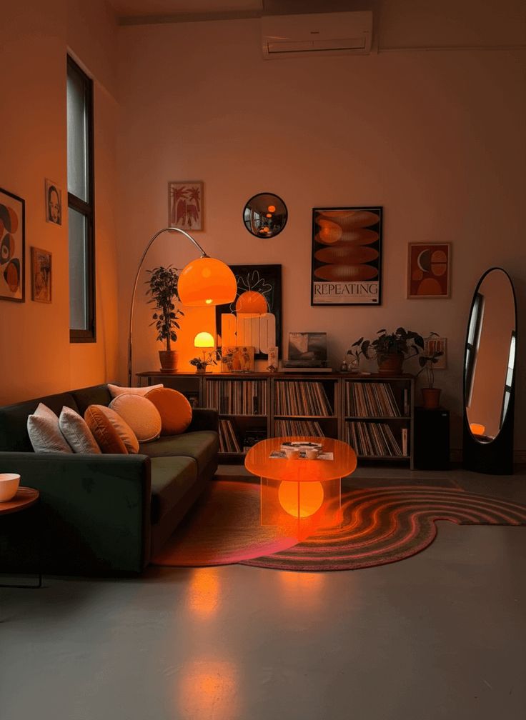 Cozy living room with warm orange lighting, modern decor, green couch, and vinyl records, perfect for relaxation and chilling.
