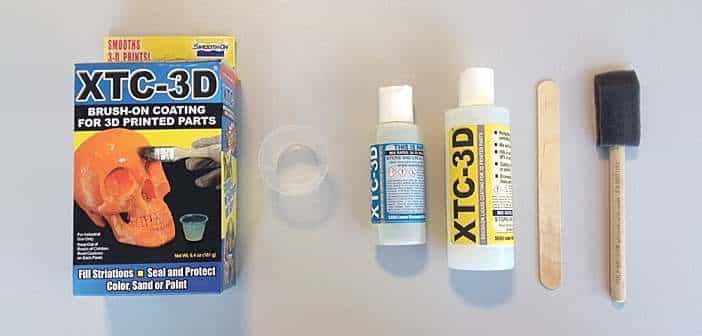 XTC-3D-01 XTC-3D coating kit for 3D prints shown with bottles, a mixing cup, stir stick, and foam brush. | Sky Rye Design XTC-3D coating kit for 3D prints shown with bottles, a mixing cup, stir stick, and foam brush.