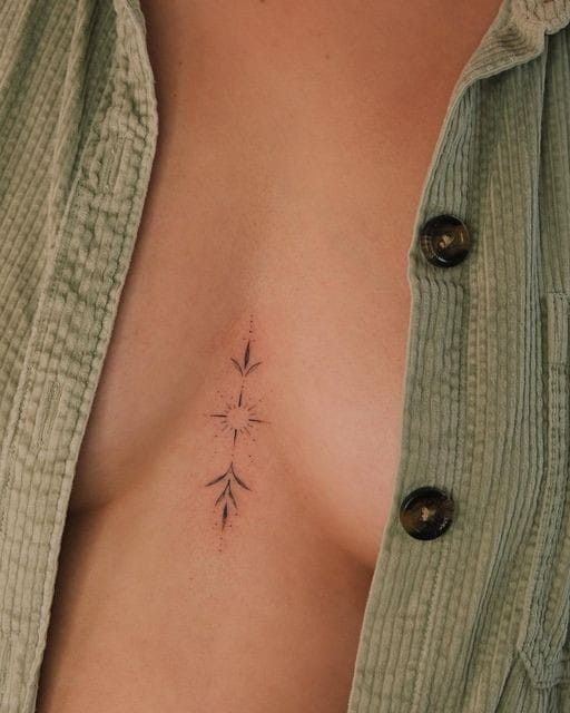 a3bd7041f0ab9f067c87edd2f0ffdd54 Minimalist starburst tattoo on chest, visible through open green corduroy shirt. | Sky Rye Design Minimalist starburst tattoo on chest, visible through open green corduroy shirt.