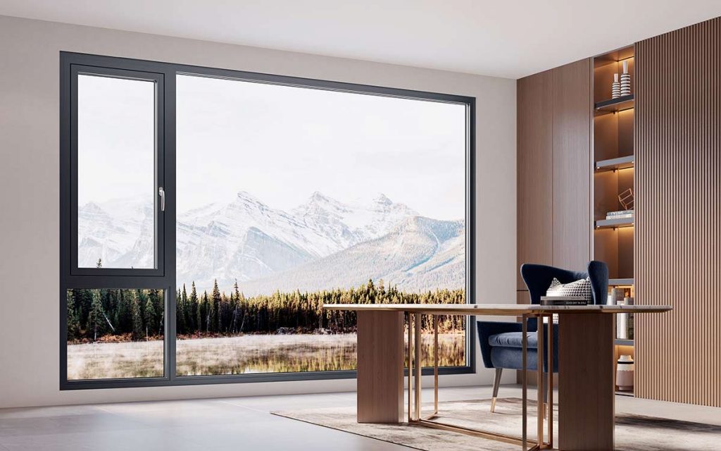 Modern office interior with large window view of mountain landscape, wooden desk, and stylish shelving.