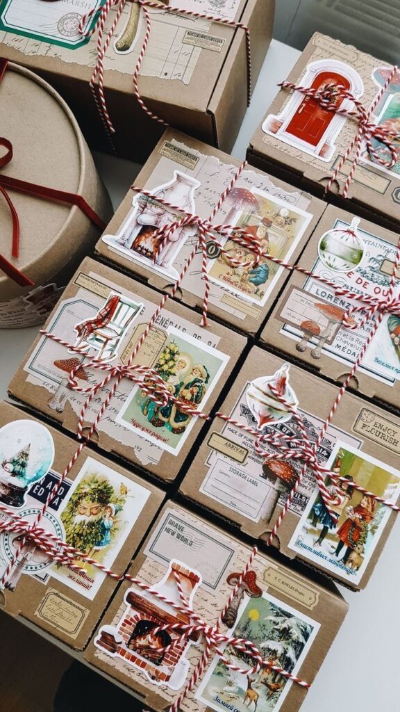 cf2b0ef5-90c0-454e-a7a0-a5daac873bca Vintage-style gift boxes with decorative holiday stickers and twine, perfect for Christmas packaging and festive celebrations. | Sky Rye Design Vintage-style gift boxes with decorative holiday stickers and twine, perfect for Christmas packaging and festive celebrations.