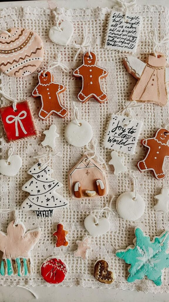 christybeasley on Instagram_ 🎄EASY DOUGH ORNAMENTS😍 I remember making salt dough ornaments as a kid but over the years I started making this recipe with baking soda Handcrafted Christmas ornaments including gingerbread men, trees, and stars on a crochet tablecloth. | Sky Rye Design Handcrafted Christmas ornaments including gingerbread men, trees, and stars on a crochet tablecloth.