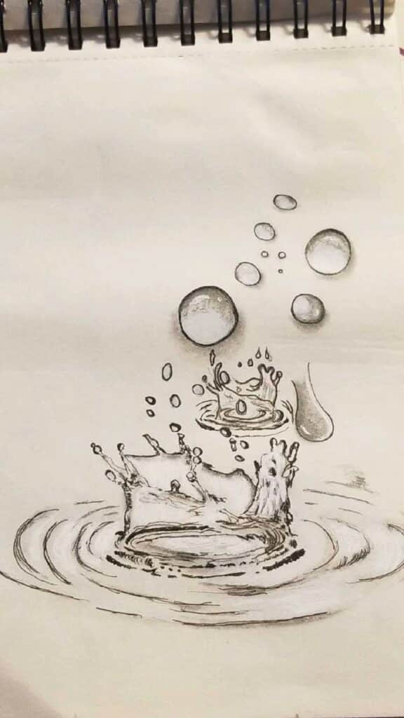 Sketch of a water splash with bubbles rising above the ripples, capturing motion and fluid dynamics on a blank sketchbook page.