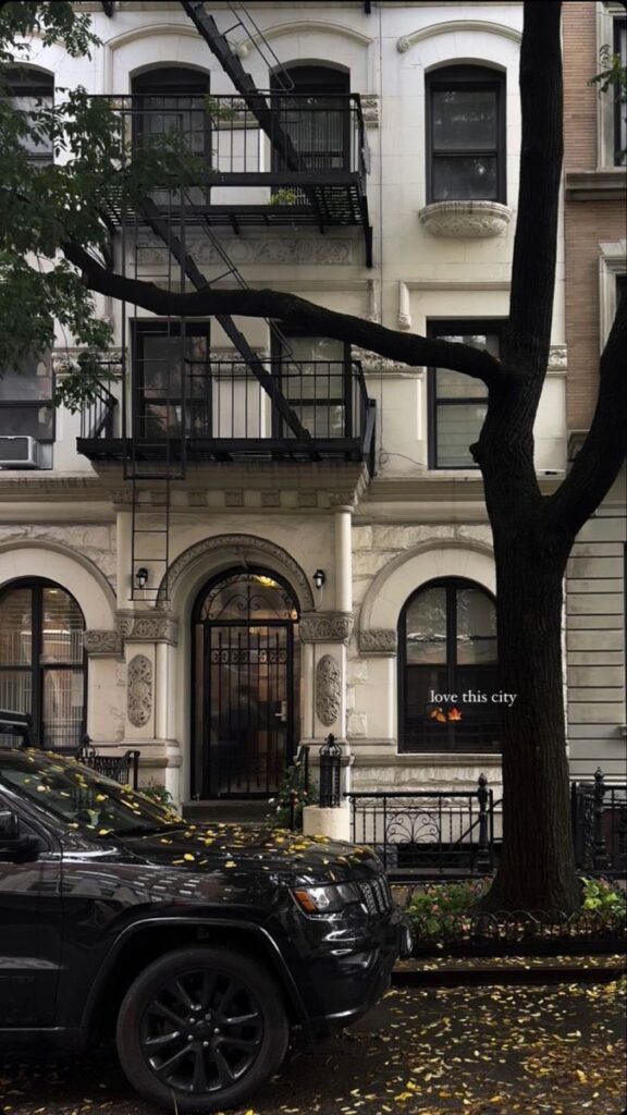 dgbdf Historic urban building with fire escape, tree, and car in fall setting. Text on window says love this city with leaves. | Sky Rye Design Historic urban building with fire escape, tree, and car in fall setting. Text on window says love this city with leaves.