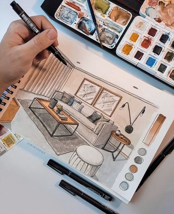 Hand-drawn interior design sketch with watercolors, showcasing a modern living room setup with a cozy sofa and minimalist decor.