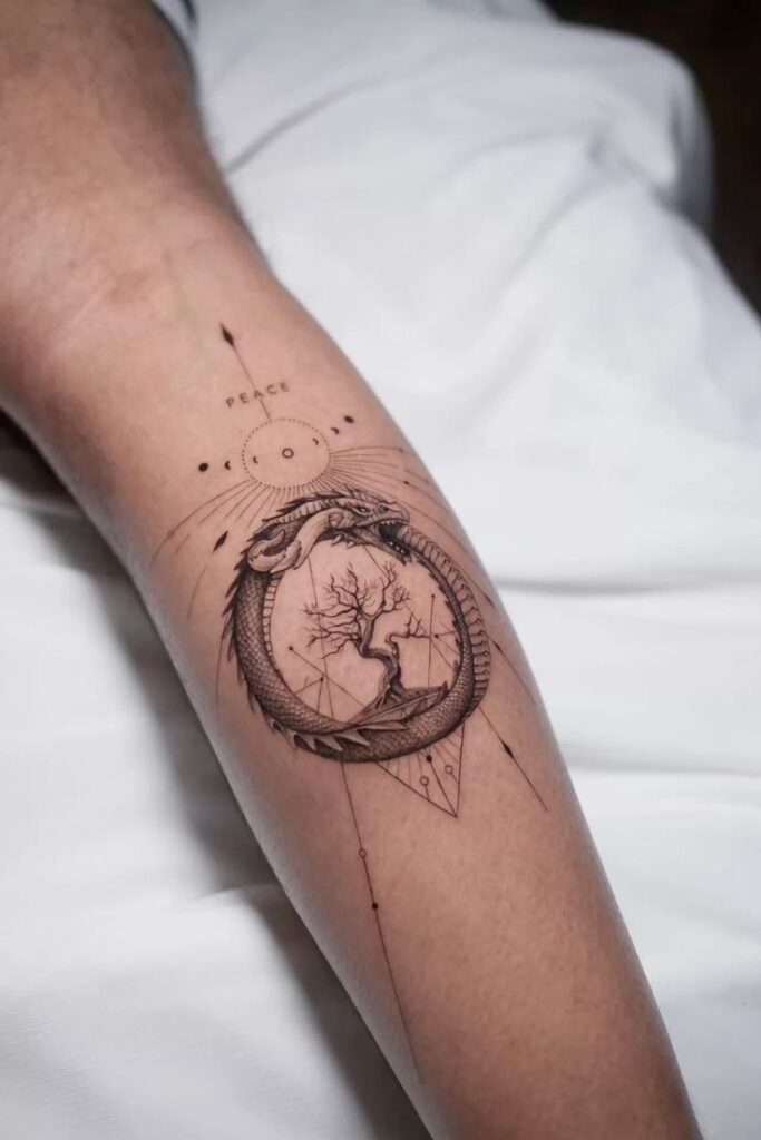 Tattoo of a dragon ouroboros encircling a tree on a forearm, signifying peace and infinity, with geometric elements.