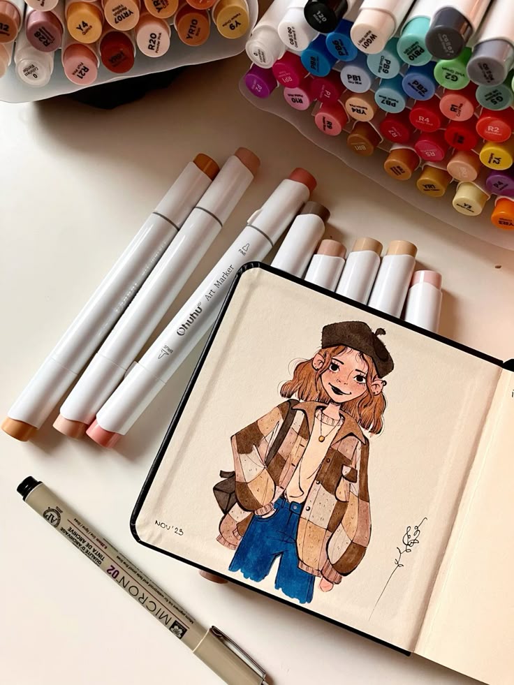 Sketch of a smiling girl in a brown checkered jacket surrounded by colorful markers on a white desk.