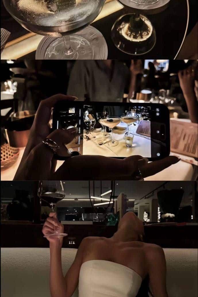rtgb Cocktail evening: martini close-up, phone taking drink photo, person relaxing with a glass in a chic setting. | Sky Rye Design Cocktail evening: martini close-up, phone taking drink photo, person relaxing with a glass in a chic setting.