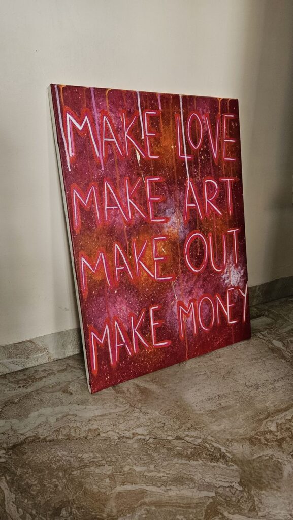 Neon-themed artwork with motivational phrases: Make Love, Make Art, Make Out, Make Money.