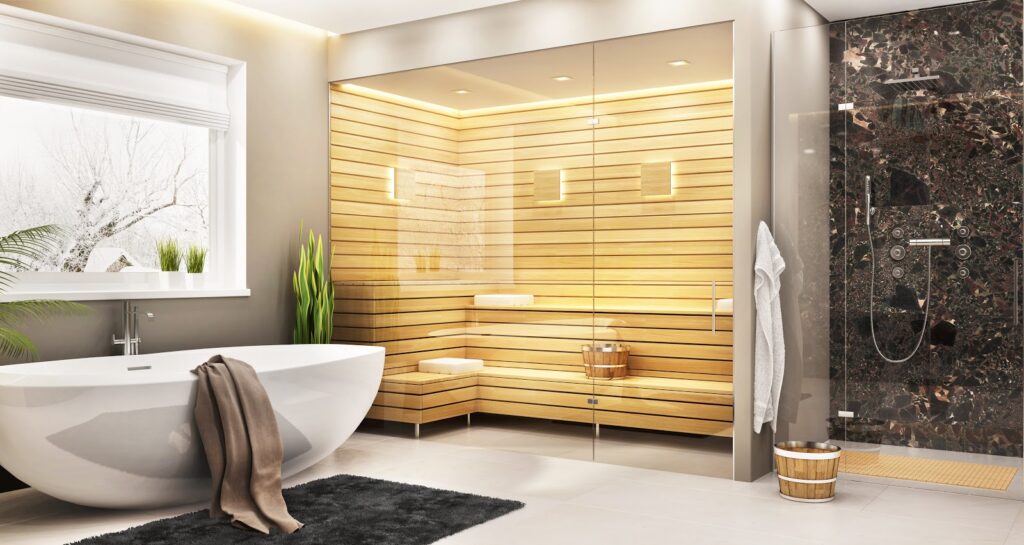 Luxurious bathroom with a modern bathtub, glass sauna, and elegant shower, set against a serene winter landscape outside the window.
