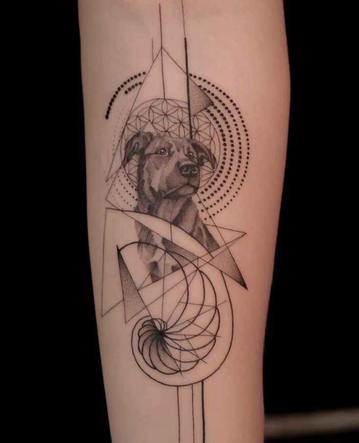 _ Geometric dog tattoo with intricate patterns and lines on forearm. | Sky Rye Design Geometric dog tattoo with intricate patterns and lines on forearm.