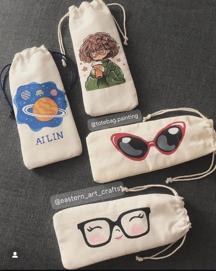 xfgnzdgn Hand-painted drawstring pouches featuring cute designs and glasses, perfect for stylish storage solutions. | Sky Rye Design Hand-painted drawstring pouches featuring cute designs and glasses, perfect for stylish storage solutions.