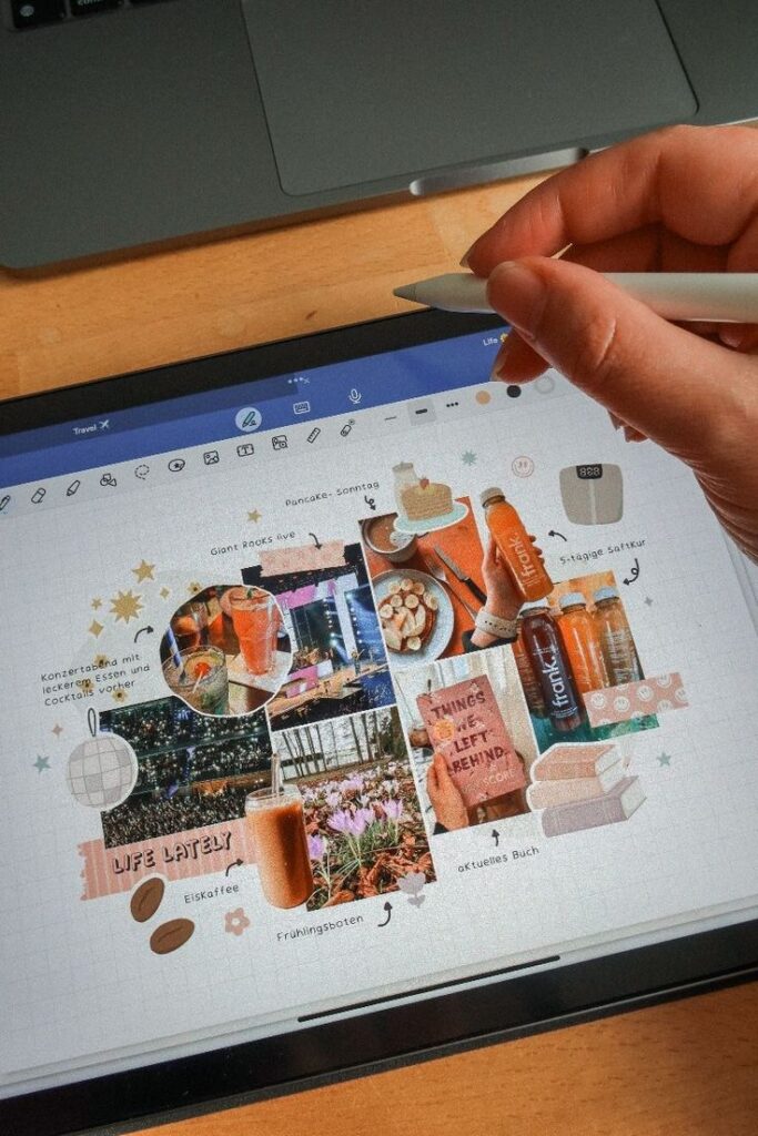 Digital collage on tablet, showcasing books, drinks, flowers, and handwritten notes. A hand uses a stylus for creative journaling.