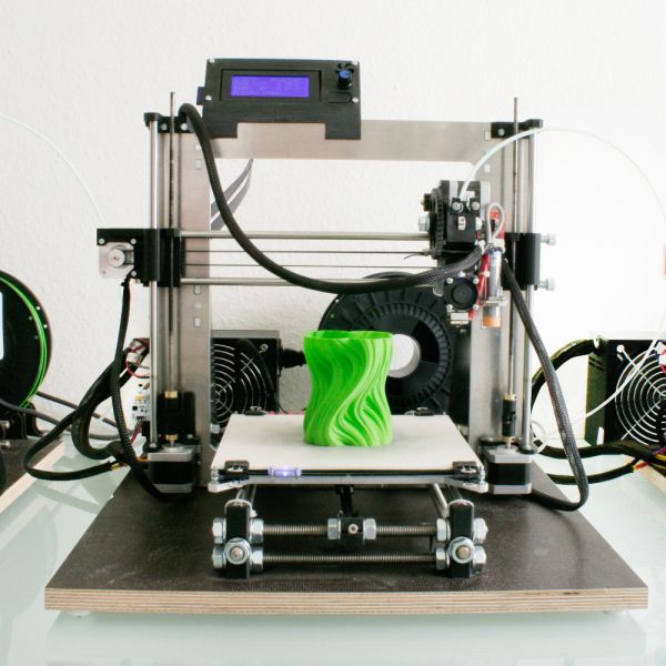 06f5b80a7bb2077cbc6986d676df68cc 3D printer creating a green, wavy object, showcasing modern additive manufacturing technology and intricate design capabilities. | Sky Rye Design 3D printer creating a green, wavy object, showcasing modern additive manufacturing technology and intricate design capabilities. 5 STL website keywords.