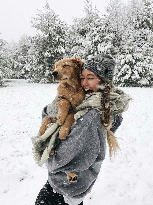 10 Things Every Active Outdoor Dog Needs To Be Happy And Healthy Woman hugging golden retriever puppy in snowy forest, both wrapped in cozy winter clothing. Winter wonderland vibes with snow-covered trees. | Sky Rye Design Woman hugging golden retriever puppy in snowy forest, both wrapped in cozy winter clothing. Winter wonderland vibes with snow-covered trees.