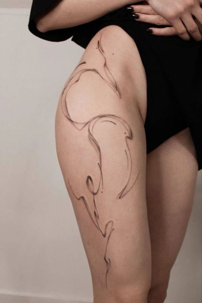 _ 11 Abstract line art tattoo on a person's thigh, featuring flowing curves and intricate design elements. | Sky Rye Design Abstract line art tattoo on a person's thigh, featuring flowing curves and intricate design elements. bold thigh tattoos women bold thigh tattoos women