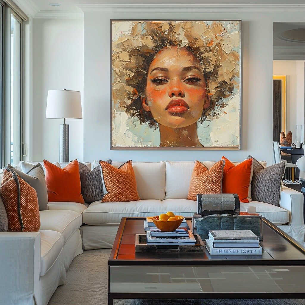 Stylish living room with cozy sectional sofa, vibrant orange pillows, and a large modern portrait painting on the wall.