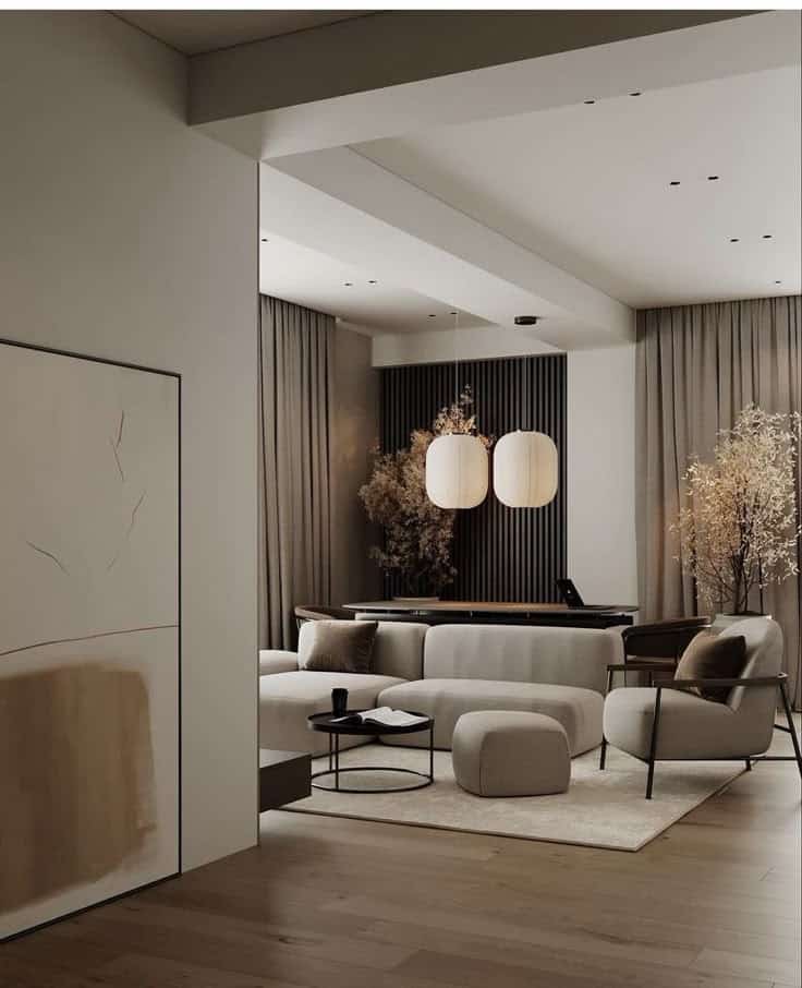 _ 19 Minimalist living room with modern furniture, neutral tones, elegant pendant lights, and large art piece. Cozy, contemporary interior design. | Sky Rye Design Minimalist living room with modern furniture, neutral tones, elegant pendant lights, and large art piece. Cozy, contemporary interior design.