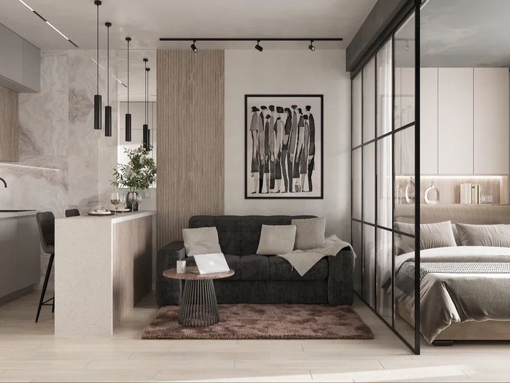 _ 20 Modern open-concept living room with cozy sofa, stylish decor, kitchen island, and bedroom separated by glass panel wall. Minimalist design. | Sky Rye Design Modern open-concept living room with cozy sofa, stylish decor, kitchen island, and bedroom separated by glass panel wall. Minimalist design.