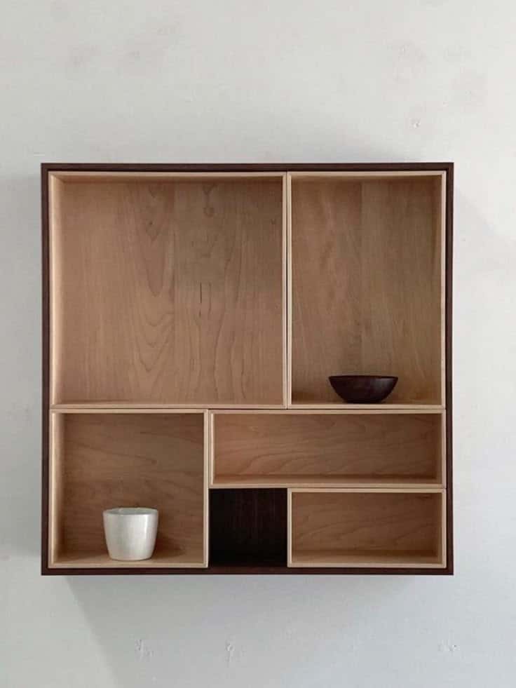 _ - 2025-12-01T200507357 Minimalist wooden shelf with compartments, displaying two small bowls, mounted on a plain white wall. Perfect for modern decor. | Sky Rye Design Minimalist wooden shelf with compartments, displaying two small bowls, mounted on a plain white wall. Perfect for modern decor.