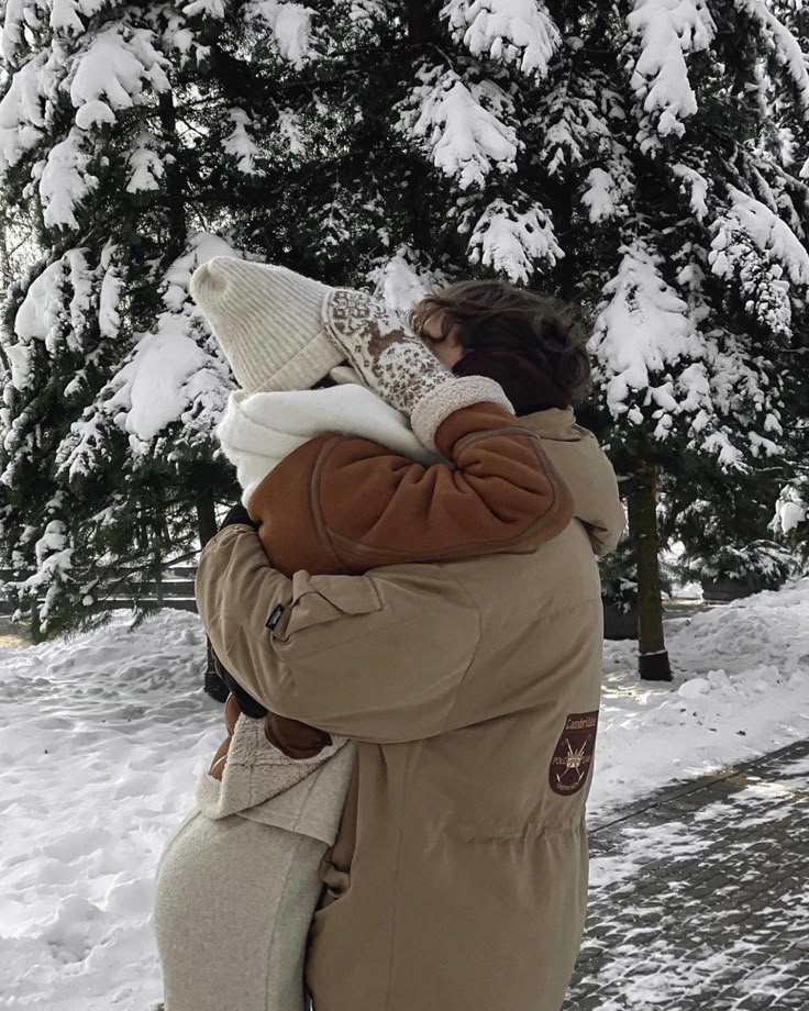 _ - 2025-12-04T132827855 Couple hugs warmly in winter coats amidst snow-covered trees, capturing a cozy winter moment in a serene forest setting. | Sky Rye Design Couple hugs warmly in winter coats amidst snow-covered trees, capturing a cozy winter moment in a serene forest setting.