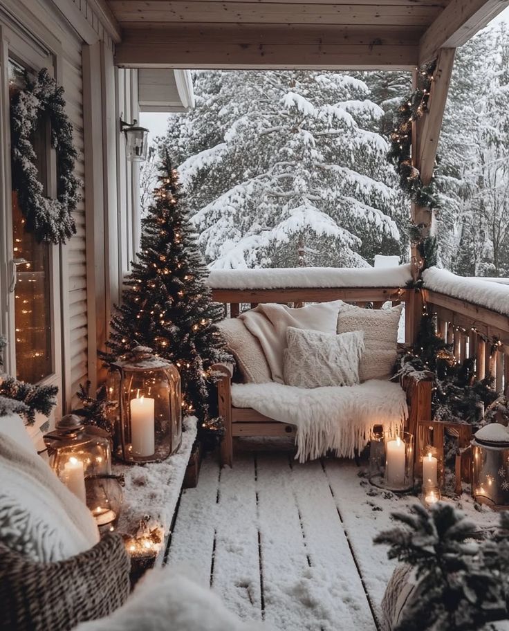 Cozy winter porch with snow, fairy lights, candles, and a Christmas tree, creating a warm and inviting holiday ambiance.