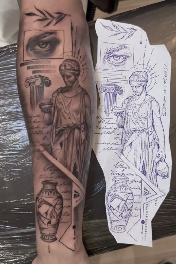 Realistic black and grey tattoo of a Greek statue, eye, and column on forearm, with matching stencil design beside it.