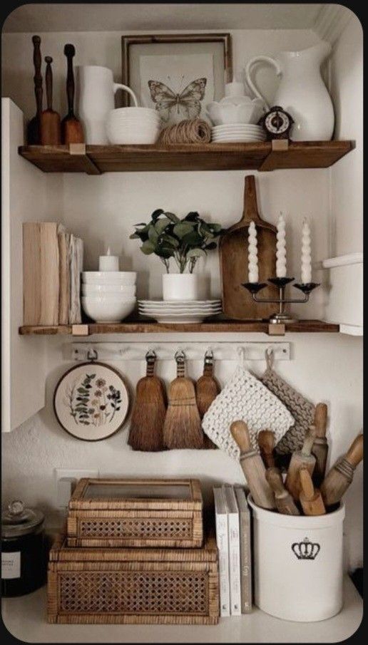 _ - 2025-12-10T134337234 Rustic kitchen shelves with vintage decor, white dishes, cutting boards, wicker baskets, candles, and utensils creating a cozy farmhouse feel. | Sky Rye Design Rustic kitchen shelves with vintage decor, white dishes, cutting boards, wicker baskets, candles, and utensils creating a cozy farmhouse feel.