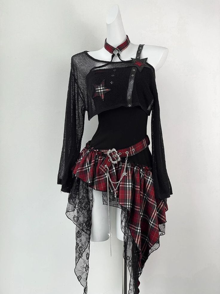 Edgy punk style outfit with black mesh top, plaid stars, layered red plaid skirt, chain accents, and asymmetrical lace trim.