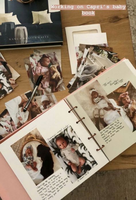 _ - 2025-12-12T132119449 Creating a baby scrapbook with photos and handwritten notes on a wooden table. Personal keepsakes and cherished memories displayed creatively. | Sky Rye Design Creating a baby scrapbook with photos and handwritten notes on a wooden table. Personal keepsakes and cherished memories displayed creatively.