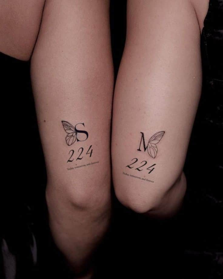 _ - 2025-12-12T151804364 Matching tattoos featuring butterfly designs with initials S and M and the number 224 symbolize a lasting bond on two arms. | Sky Rye Design Matching tattoos featuring butterfly designs with initials S and M and the number 224 symbolize a lasting bond on two arms.