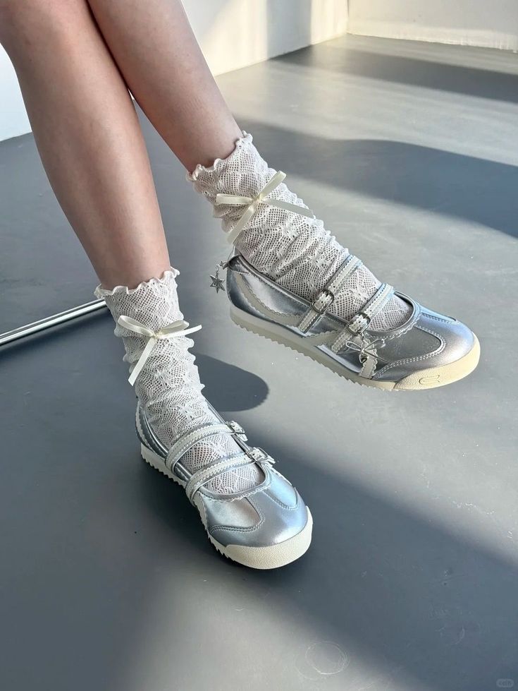 _ - 2025-12-28T125146091 Stylish silver shoes with intricate lace socks, perfect for a chic and trendy look. Ideal footwear choice for fashion-forward individuals. | Sky Rye Design Stylish silver shoes with intricate lace socks, perfect for a chic and trendy look. Ideal footwear choice for fashion-forward individuals.
