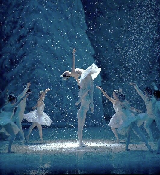 _ - 2025-12-28T140340809 Ballet dancers perform gracefully on a snowy stage, creating a magical winter wonderland under falling snowflakes. | Sky Rye Design Ballet dancers perform gracefully on a snowy stage, creating a magical winter wonderland under falling snowflakes.