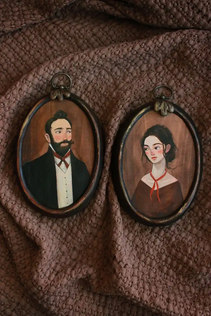 Illustrated vintage-style portraits of a man and woman in ornate oval frames, set on textured brown fabric background.
