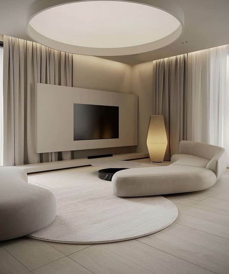 _ 27 Minimalist living room with modern furnishings, round ceiling light, and cozy beige seating. Neutral tones create a serene, elegant ambiance. | Sky Rye Design Minimalist living room with modern furnishings, round ceiling light, and cozy beige seating. Neutral tones create a serene, elegant ambiance.