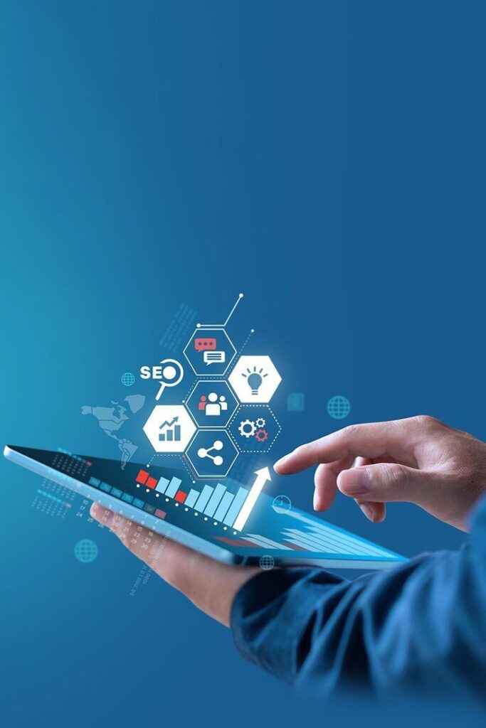 _ 3 Hands using a tablet with SEO icons and a digital graph, symbolizing digital marketing and search engine optimization concepts. | Sky Rye Design Hands using a tablet with SEO icons and a digital graph, symbolizing digital marketing and search engine optimization concepts.