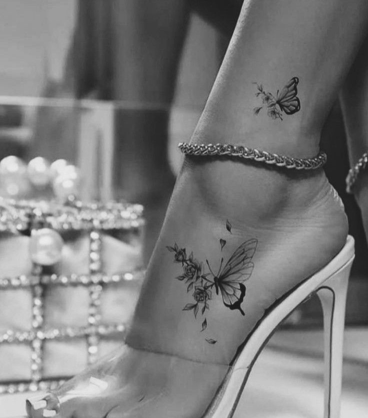 _ 37 Elegant ankle tattoos featuring butterflies and florals paired with a chic anklet and high heels for a stylish, sophisticated look. | Sky Rye Design Elegant ankle tattoos featuring butterflies and florals paired with a chic anklet and high heels for a stylish, sophisticated look.