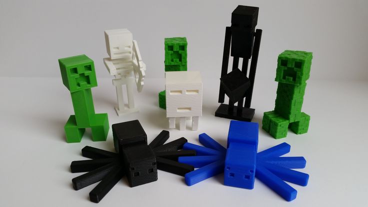 3D Printed Minecraft Mobs as Educational Tool 3D printed Minecraft characters including creepers, skeletons, and spiders on a white background, showcasing detailed blocky designs. | Sky Rye Design 3D printed Minecraft characters including creepers, skeletons, and spiders on a white background, showcasing detailed blocky designs.