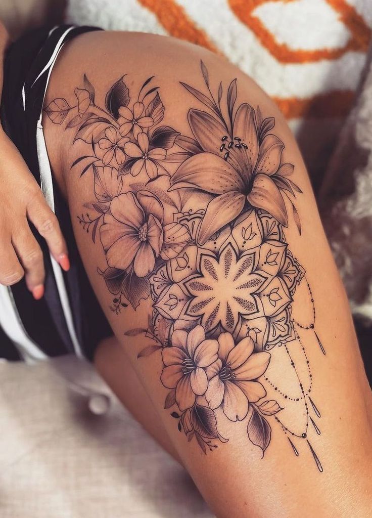 _ 4 Intricate floral tattoo design on thigh, featuring lilies and mandala patterns, showcasing detailed linework and shading artistry. | Sky Rye Design Intricate floral tattoo design on thigh, featuring lilies and mandala patterns, showcasing detailed linework and shading artistry. large thigh tattoos women