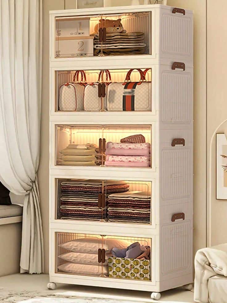 4layer Plastic Storage Bins Foldable Storage Bins With LIDS And Wheels Foldable Storage Boxes With Doors Closet Storage And Storage Drawers Foldable Stackable Lockers Outdoor Decor Stacked storage cabinets with illuminated shelves holding handbags, clothes, and linen for organized home storage solutions. | Sky Rye Design Stacked storage cabinets with illuminated shelves holding handbags, clothes, and linen for organized home storage solutions.