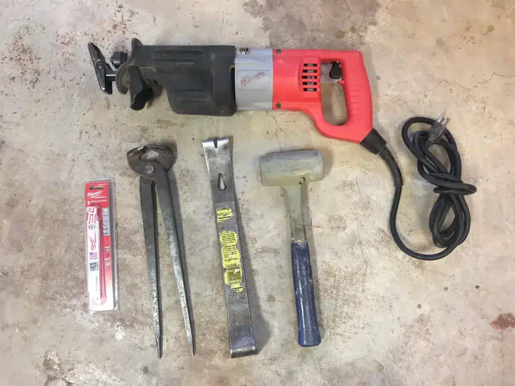 54436083_833981210273264_3533095352443863040_n Set of DIY tools on a concrete floor: reciprocating saw, pliers, crowbar, mallet, replacement blades, and electrical cord. | Sky Rye Design Set of DIY tools on a concrete floor: reciprocating saw, pliers, crowbar, mallet, replacement blades, and electrical cord.
